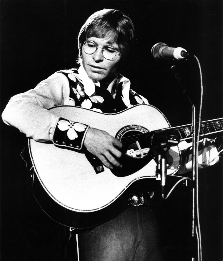John Denver performs live at the Jaap Eden Hall in Amsterdam, Netherlands on July 08 1979