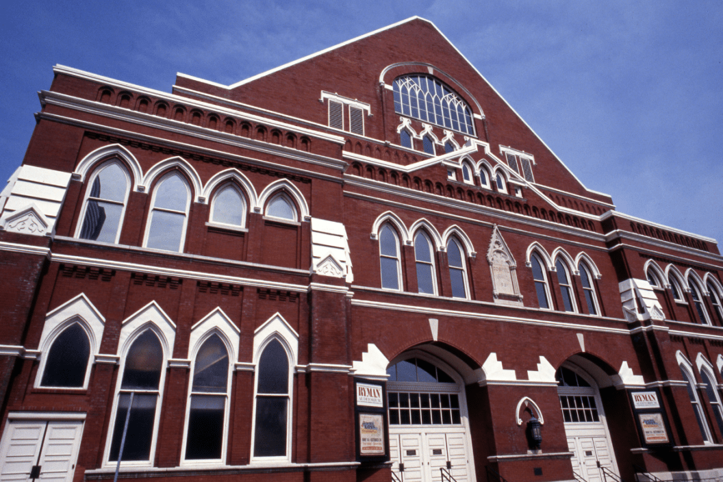 Ryman Auditorium, which is on the National Register of Historic Places and is the former home of the Grand Ole Opry, facing Nashville's Fifth Ave North, 1974, Nashville, Tennessee.