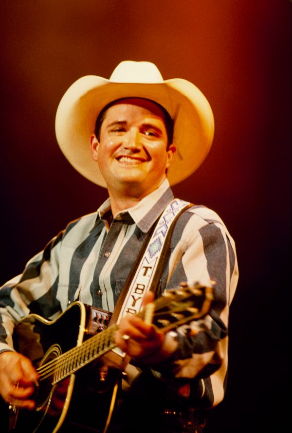 UNITED STATES - JANUARY 01: American singer Tracy Byrd performs on stage in 1995.