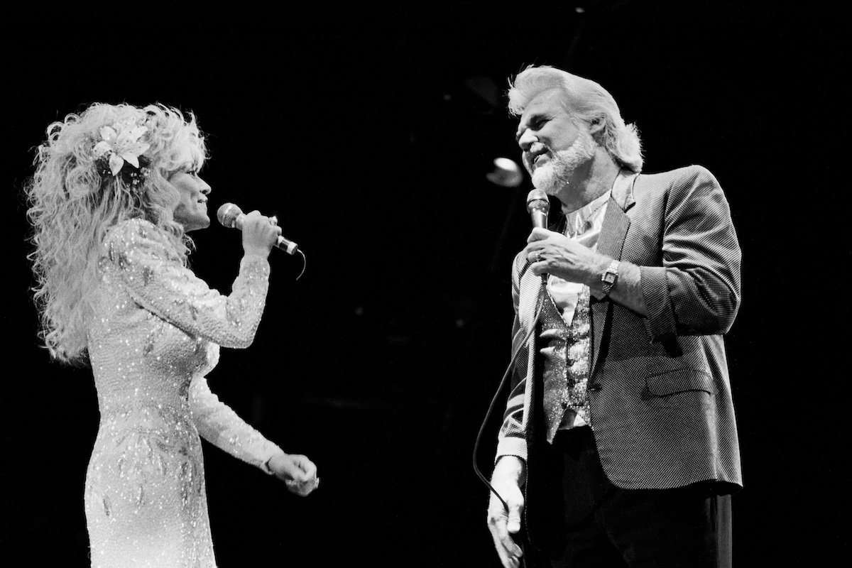 American Country musicians Dolly Parton and Kenny Rogers (1938 - 2020) perform together onstage at Brendan Byrne Arena (later Meadowlands Arena), East Rutherford, New Jersey, October 20, 1988.