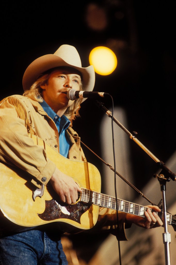 Photo of Alan JACKSON; Alan Jackson performing at Farm Aid in Indianapolis, Indiana on April 7, 1990