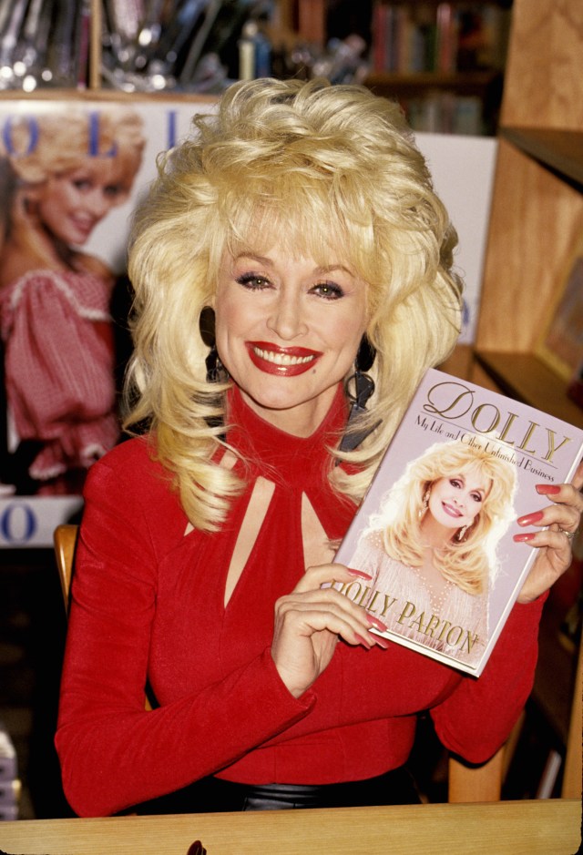 Dolly Parton Signs Her New Book "Dolly: My Life And Other Unfinished Business