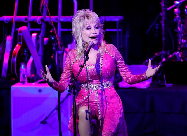 Dolly Parton performs at the 2021 Kiss Breast Cancer Goodbye Concert at CMA Theater at the Country Music Hall of Fame and Museum on October 24, 2021 in Nashville, Tennessee. 