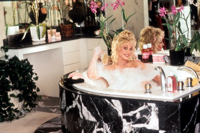 Dolly Parton takes a bath in a scene from the film 'Straight Talk', 1992. 