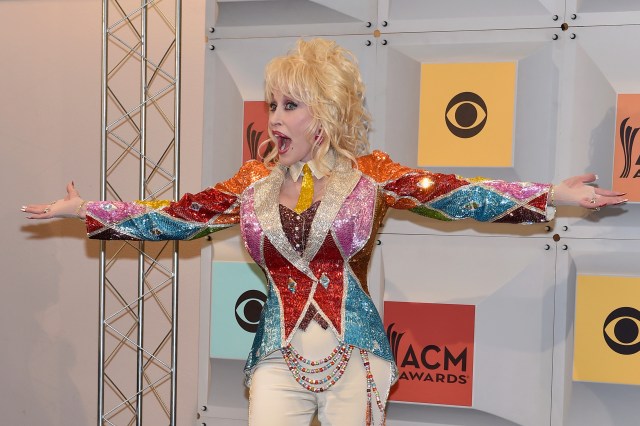 Singer-songwriter and producer Dolly Parton, winner of the Tex Ritter Award for 'Dolly Parton's Coat of Many Colors,' poses in the press room during the 51st Academy of Country Music Awards at MGM Grand Garden Arena on April 3, 2016 in Las Vegas, Nevada.