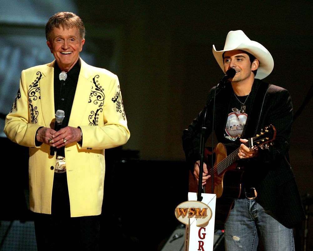 Bill Anderson and Brad Paisley perform during a 2005 Grand Ole Opry taping in New York City.