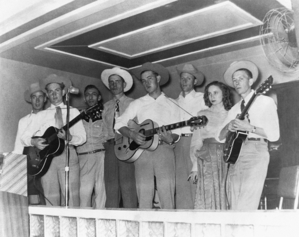 Country singer/songwriter Willie Nelson (second from left) performs onstage with a band in circa 1955 in Texas. 