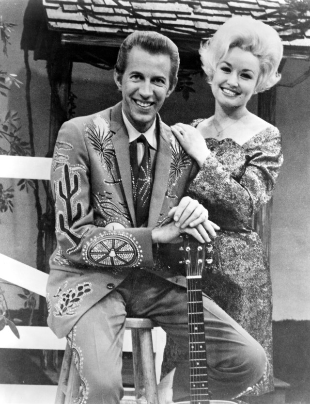 Country singer Dolly Parton with her collaborator Porter Wagoner on the set of his TV show in circa 1967.