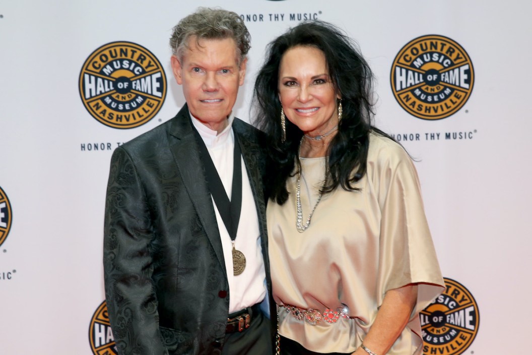 Randy Travis and his wife Mary pose at a Country Music Hall of Fame medallion ceremony.