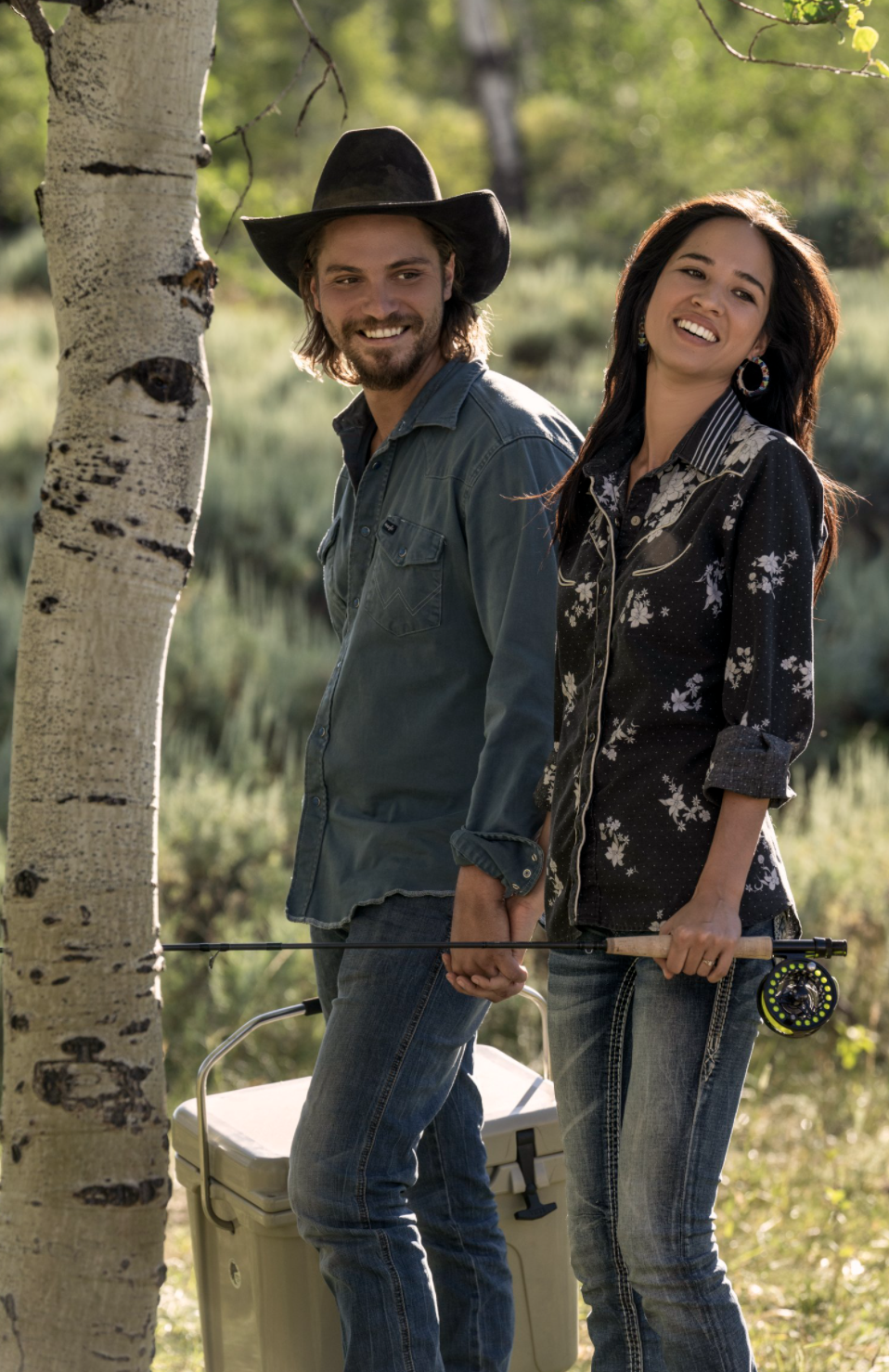 Luke Grimes as Kayce Dutton and Kelsey Asbille as Monica Dutton in 'Yellowstone'