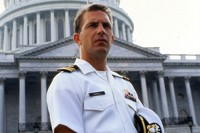 Kevin Costner stands in front of the Capitol Building in a scene from the film 'No Way Out', 1987