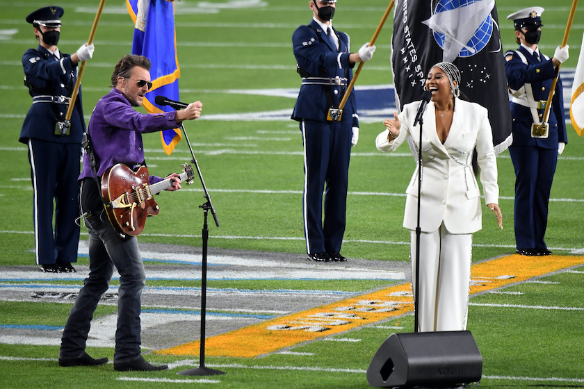 TAMPA, FLORIDA - FEBRUARY 07: (L-R) Eric Church and Jazmine Sullivan perform during the Super Bowl LV Pregame at Raymond James Stadium on February 07, 2021 in Tampa, Florida. 