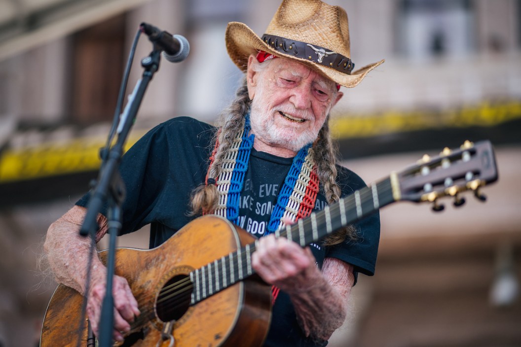 Musician Willie Nelson performs during the Georgetown to Austin March for Democracy rally on July 31, 2021 in Austin.