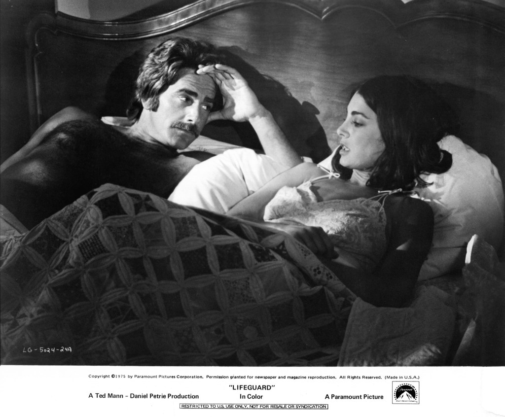 Sam Elliott and Anne Archer in bed together in a scene from the film 'Lifeguard', 1976. (Photo by Paramount/Getty Images)