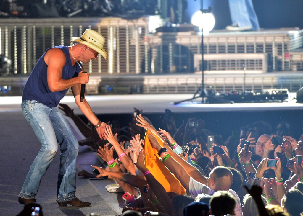 ATLANTA, GA - AUGUST 03:  Singer/Songwriter Kenny Chesney performs during Kenny Chesney's No Shoes Nation on Zac Brown's Southern Ground Tour at the Georgia Dome on August 3, 2013 in Atlanta, Georgia  (Photo by Rick Diamond/Getty Images for the No Shoes Nation Tour)