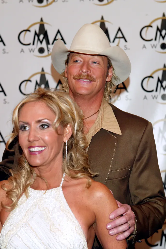 Alan Jackson arrives with his wife Denise at the 36th annual Country Music Association Awards at the Grand Ole Opry House in Nashville, Tennessee, November 6, 2002.  Photo by Scott Gries/Getty Images