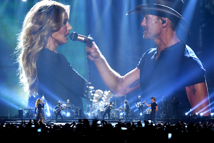 Faith Hill (L) and Tim McGraw perform onstage during the "Soul2Soul" World Tour