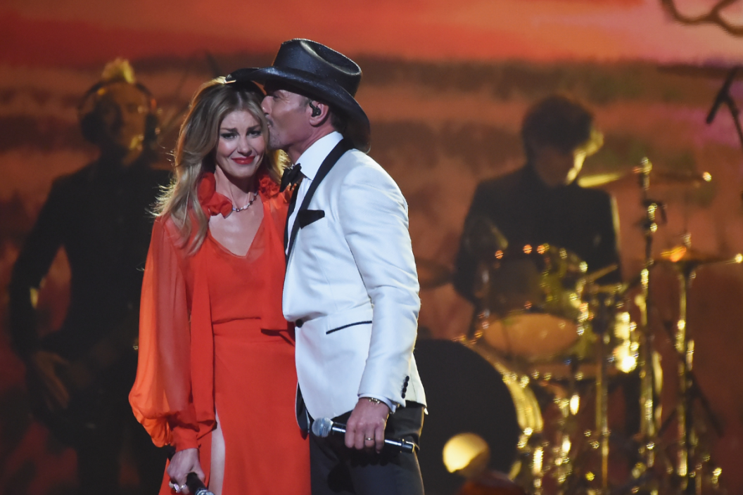Faith Hill and Tim McGraw perform onstage at the 51st annual CMA Awards