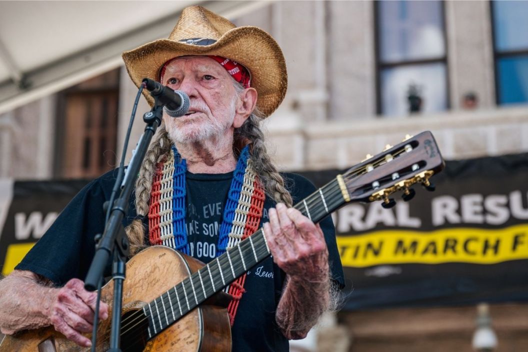 American musician Willie Nelson performs during the Georgetown to Austin March for Democracy rally on July 31, 2021 in Austin, Texas. Texas activists and demonstrators rallied at the Texas state Capitol after completing a 27-mile long march, from Georgetown to Austin, demanding federal action on voting rights legislation. (Photo by Brandon Bell/Getty Images)