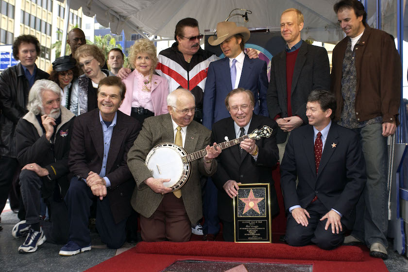 Fred Willard, Johnny Grant and Earl Scruggs during Earl Scruggs Honored with a Star on the Hollywood Walk of Fame for His Achievements in Music at Hollywood Boulevard in Hollywood.