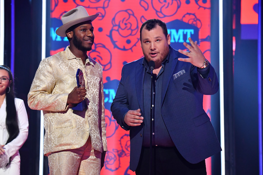 NASHVILLE, TENNESSEE - JUNE 05: Leon Bridges and Luke Combs accept and award onstage at the 2019 CMT Music Awards at Bridgestone Arena on June 05, 2019 in Nashville, Tennessee.