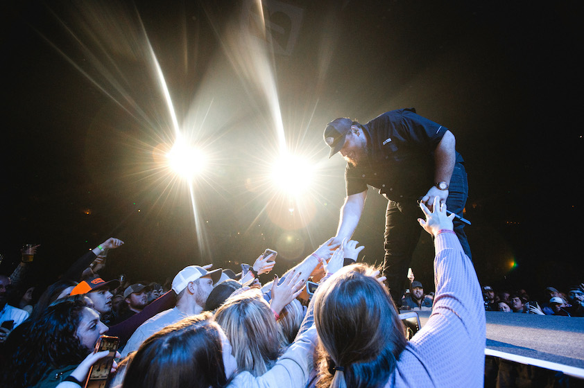 NASHVILLE, TENNESSEE - DECEMBER 13: Country singer & songwriter Luke Combs performs to a sold out audience at Bridgestone Arena on December 13, 2019 in Nashville, Tennessee.
