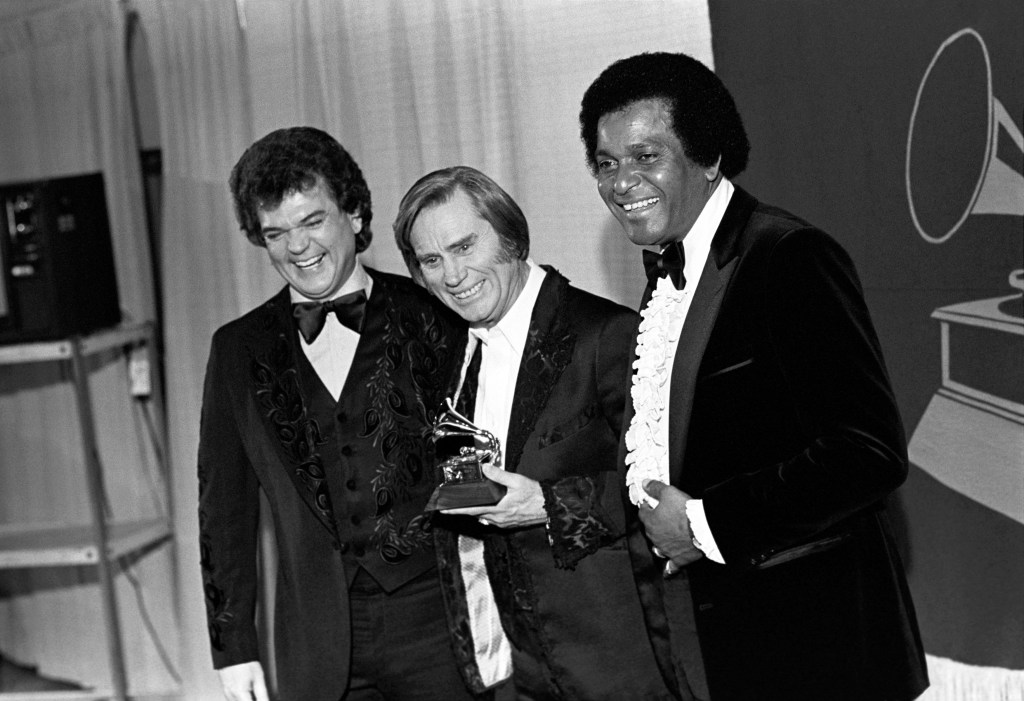Conway Twitty, George Jones and Charley Pride at the 1981 Grammy Awards at Radio City Music Hall in New York City on February 25, 1981. 