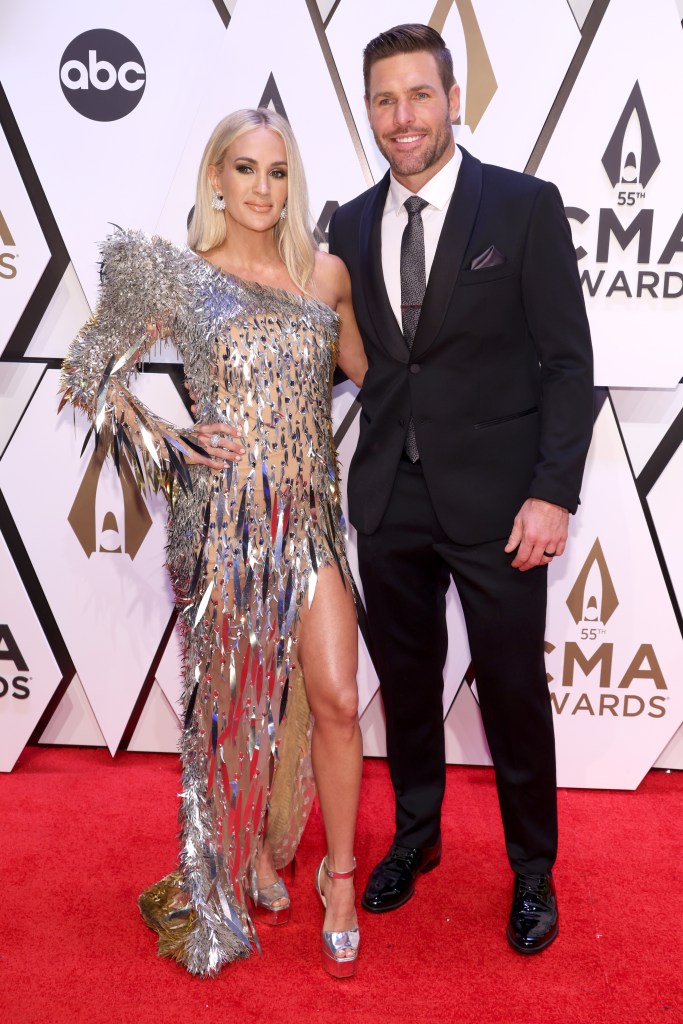 NASHVILLE, TENNESSEE - NOVEMBER 10: Carrie Underwood and Mike Fisher attend the 55th annual Country Music Association awards at the Bridgestone Arena on November 10, 2021 in Nashville, Tennessee. (Photo by John Shearer/Getty Images for CMA)
