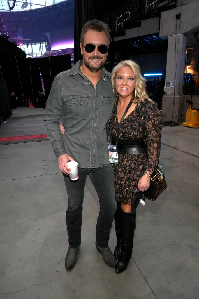 Eric Church (L) and Katherine Blasingame are seen backstage during the 57th Academy of Country Music Awards at Allegiant Stadium on March 07, 2022 in Las Vegas, Nevada. 