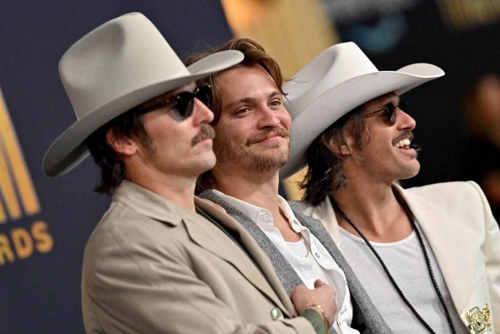 LAS VEGAS, NEVADA - MARCH 07: (L-R) Mark Wystrach of Midland, Luke Grimes and Cameron Duddy of Midland attend the 57th Academy of Country Music Awards on March 07, 2022 in Las Vegas, Nevada. (Photo by Axelle/Bauer-Griffin/FilmMagic)