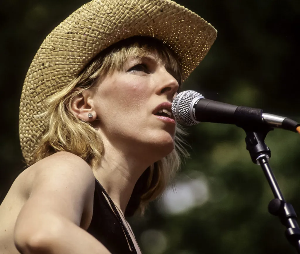 American country and folk singer musician Lucinda Williams performs at Central Park SummerStage, New York, New York, June 27, 1992. (Photo by Jack Vartoogian/Getty Images)