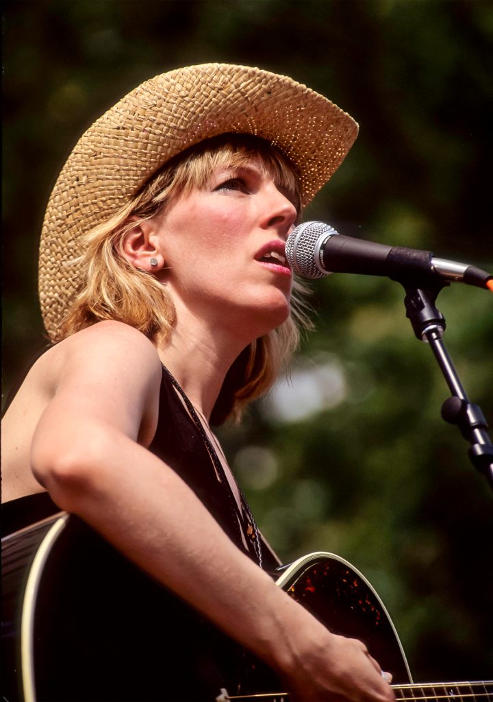 American country and folk singer musician Lucinda Williams performs at Central Park SummerStage, New York, New York, June 27, 1992. (Photo by Jack Vartoogian/Getty Images)