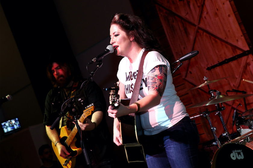 NASHVILLE, TN - JULY 13: Ashley McBryde performs onstage during the product launch of Bonnie Rose, a new Tennessee white whiskey, on July 13, 2015 in Nashville, Tennessee. 