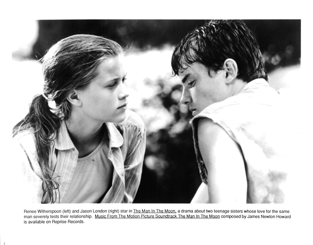 CIRCA 1991: Actress Reese Witherspoon and actor Jason London in a scene from the movie "The Man in the Moon", circa 1991. 
