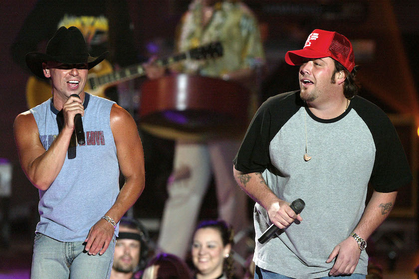 Musicians Uncle Kracker (R) and Kenny Chesney perform on stage at the "39th Annual Country Music Awards" at the Mandalay Bay Hotel & Casino on May 26, 2004 in Las Vegas.