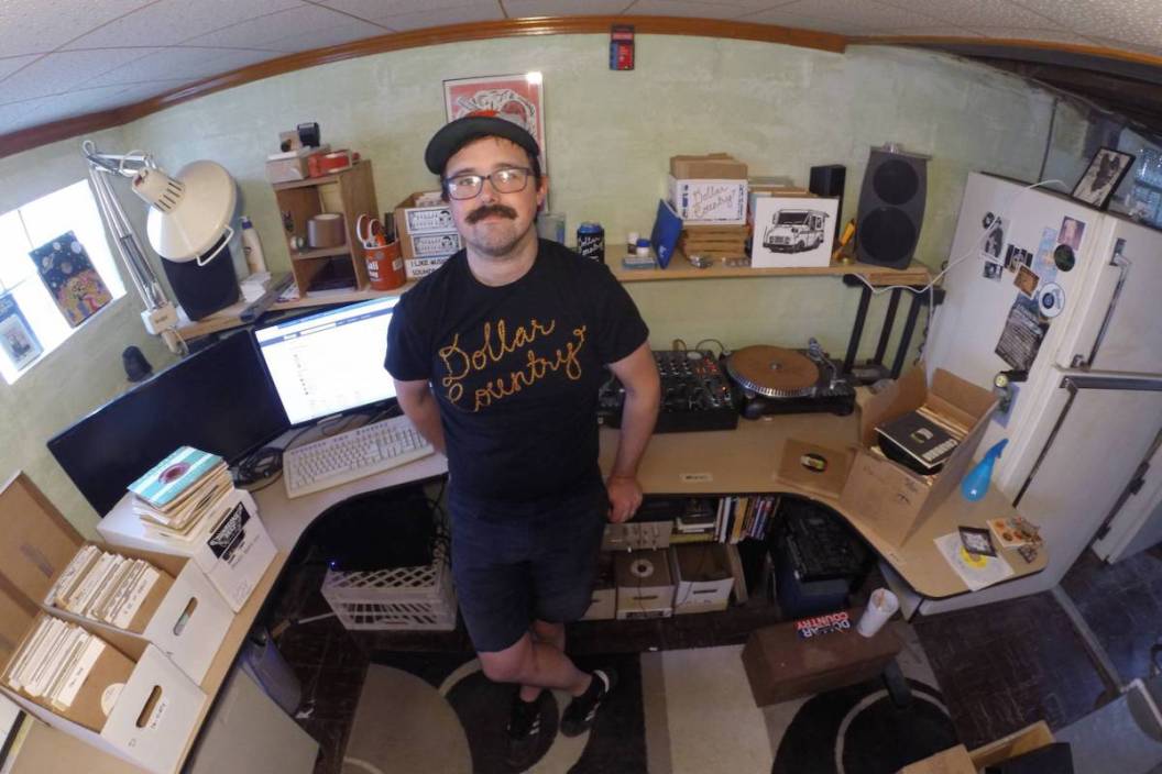 Franklin Fantini in front of his basement setup for Dollar Country