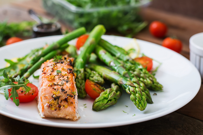 Grilled salmon and asparagus on a plate