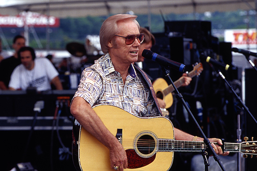NASHVILLE - 1999: Country Music Singer Songwriter George Jones performs at Fanfair in 1999 in Nashville, Tennessee