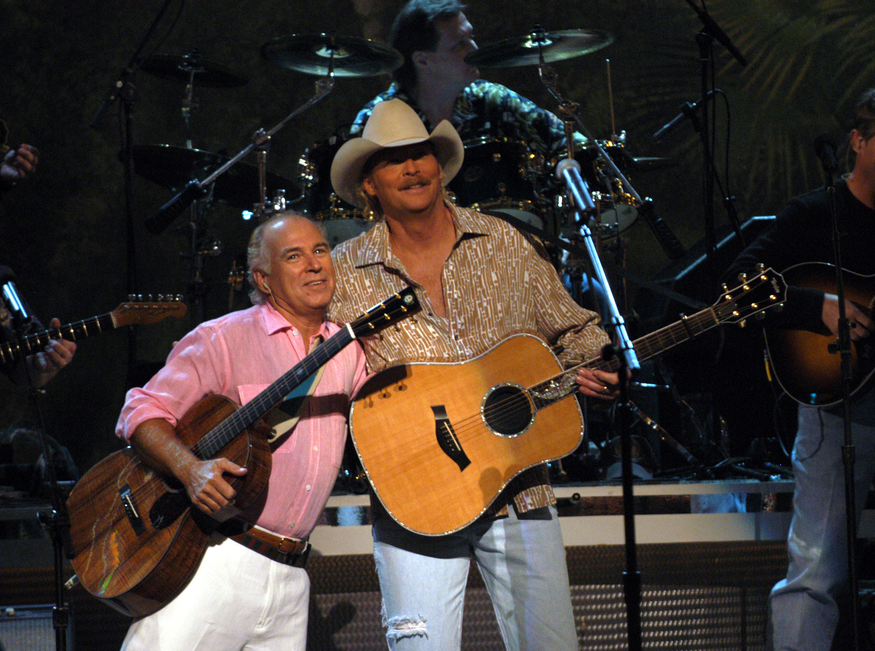 Jimmy Buffett and Alan Jackson perform the song "It's 5 O'Clock Somewhere" (
