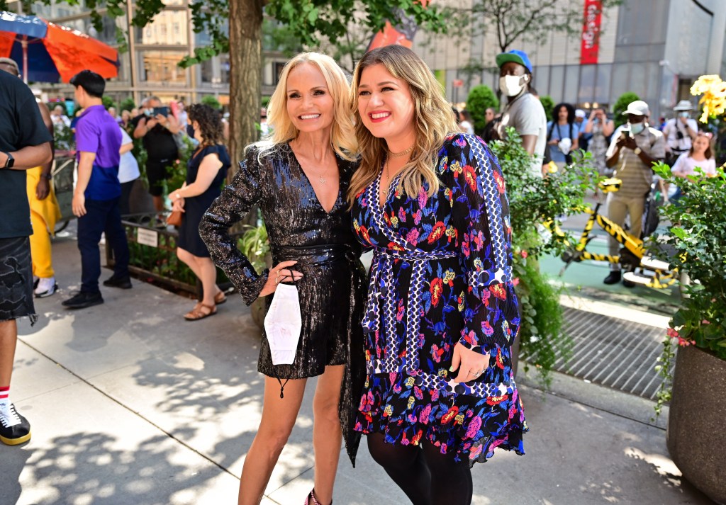 Kristen Chenoweth and Kelly Clarkson seen during a music video in Columbus Circle on August 24, 2021 in New York City.