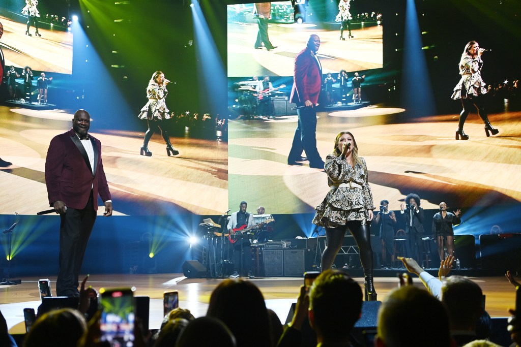  Former professional basketball player Shaquille O'Neal and singer Kelly Clarkson perform at The Event hosted by the Shaquille O'Neal Foundation at MGM Grand Garden Arena on October 02, 2021 in Las Vegas, Nevada.