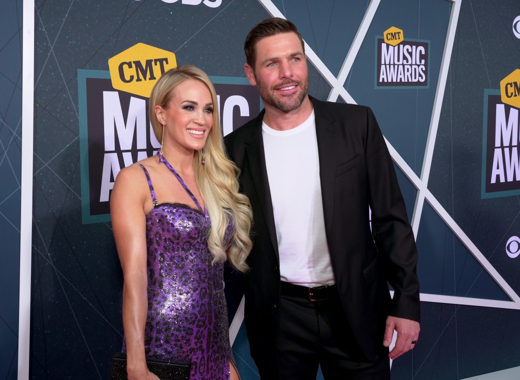 Carrie Underwood and Mike Fisher attend the 2022 CMT Music Awards at Nashville Municipal Auditorium on April 11, 2022 in Nashville, Tennessee. 