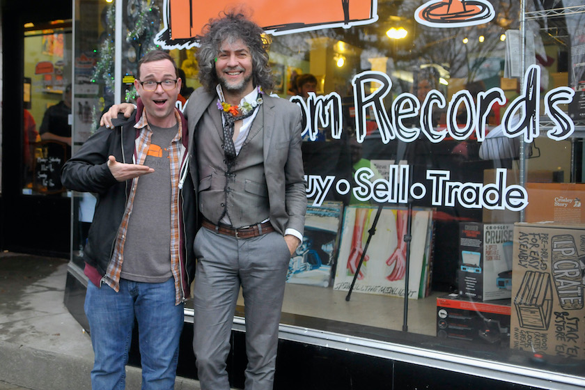 Travis Searle and Wayne Coyne pose during Wayne Coyne's Record Store Tour at Guestroom Records on December 20, 2013 in Louisville, Kentucky. 