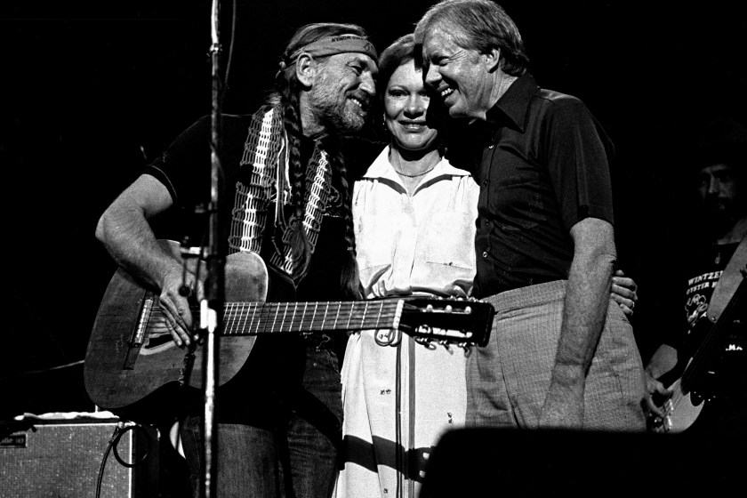 ATLANTA - December 12: Former President Jimmy Carter with Former First Lady Rosalynn join Willie Nelson and perform at The Omni Coliseum in Atlanta Georgia. December 12, 1982
