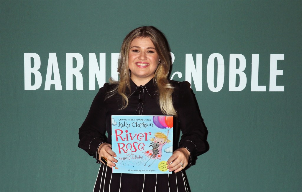 Singer Kelly Clarkson signs copies of her new book "River Rose and The Magical Lullaby" at Barnes &amp; Noble Tribeca on October 6, 2016 in New York City. 