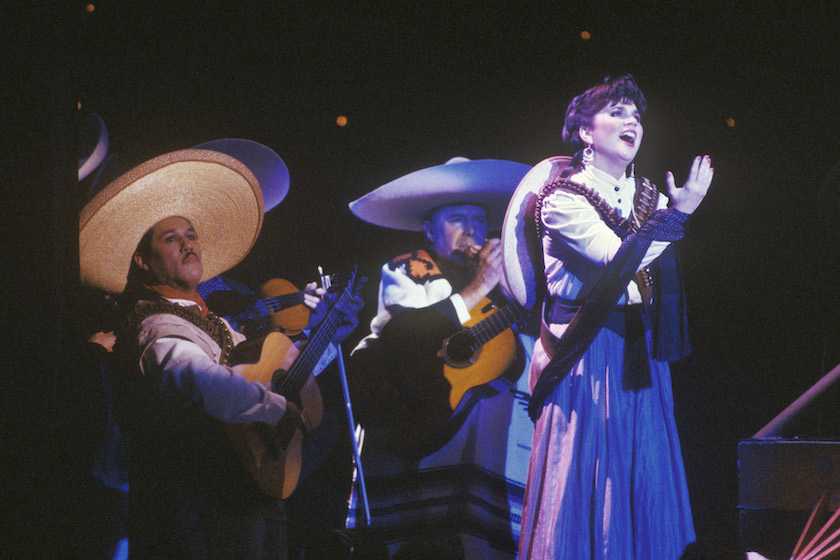 LOS ANGELES, CA - 1988: Singer Linda Ronstadt belts out songs in Spanish from her "Canciones de Mi Padre" album at a 1988 Los Angeles, California concert. Ronstadt won the 1988 Grammy Award for "Best Mexican-American Performance."