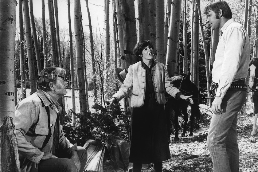 Actor JOHN WAYNE, in Oscar Winning perfromance as Rooster Cogburn, in scene from movie "True Grit" directed by Henry Hathaway. Film also features KIM DARBY and GLEN CAMPBELL.