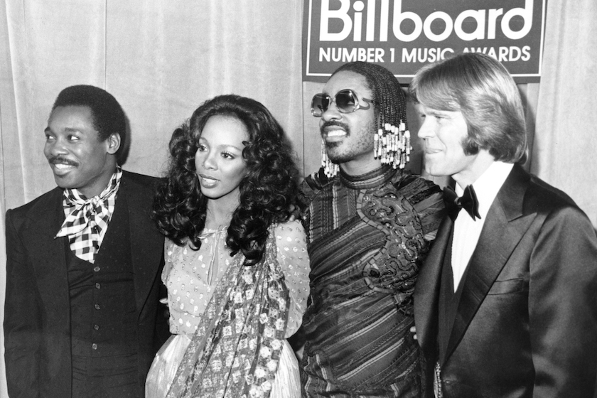 Superstars George Benson, Donna Summer, Stevie Wonder and Glen Campbell attend the "Billboard Number 1 Music Awards" in circa 1980.