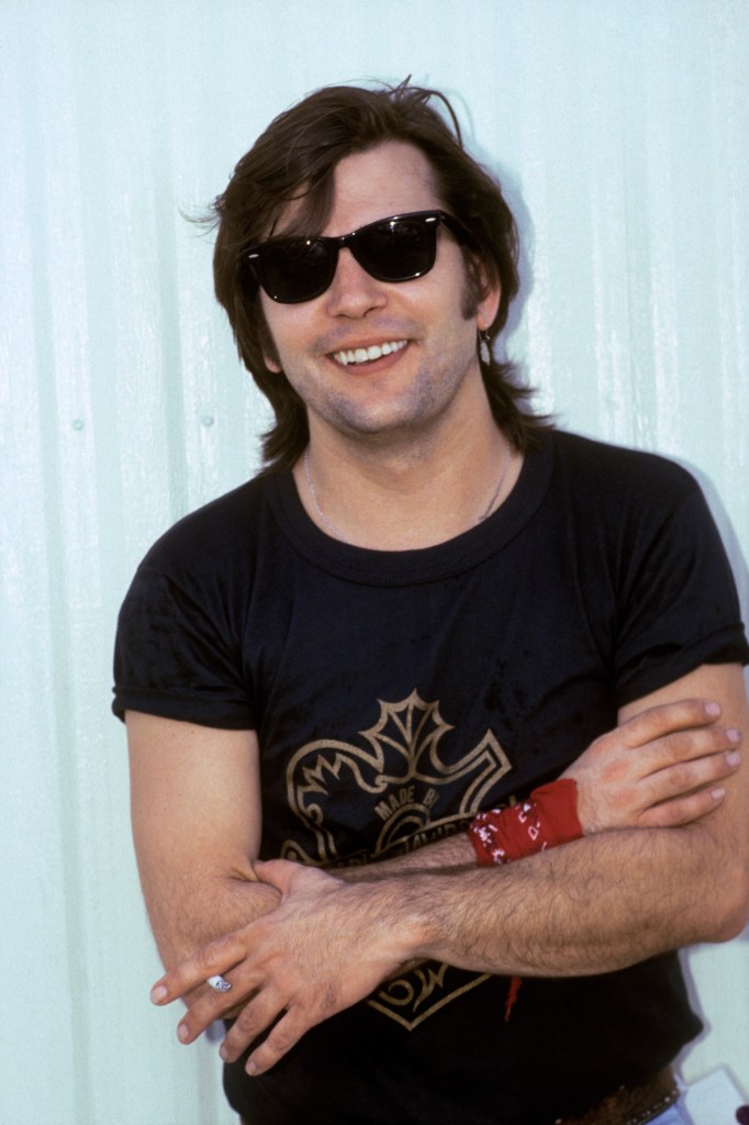 Photo of Steve EARLE; Steve Earle backstage at Farm Aid in Austin, Texas on July 4, 1986  
