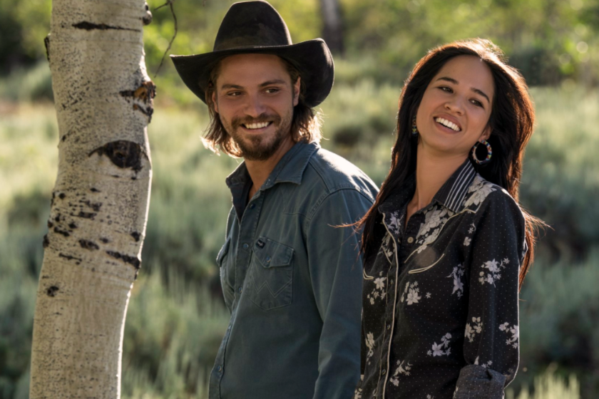 Luke Grimes as Kayce Dutton and Kelsey Asbille as Monica Dutton in scene from 'Yellowstone'